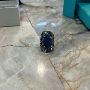 Women size5 ring , silver with dark blue stone
